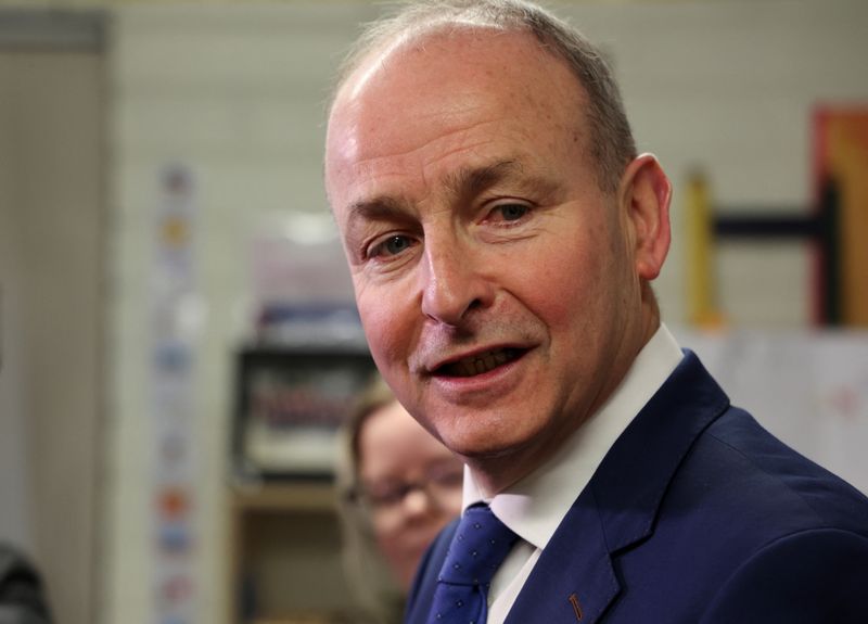  Ireland's Tanaiste (Deputy Prime Minister) and leader of Fianna Fail, Micheal Martin speaks to the media after voting at a polling station in St. Anthony's Boys National school, during Ireland's general election, in Cork, Ireland, November 29, 2024. REUTERS/Damien Eagers/File Photo