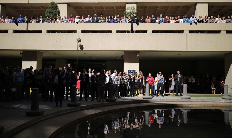 &copy; Reuters. FILE PHOTO: Federal Bureau of Investigation agents and employees stand with their hands over their hearts for the U.S. National Anthem at FBI headquarters in Washington, U.S., September 28, 2017. REUTERS/Carlos Barria/File Photo