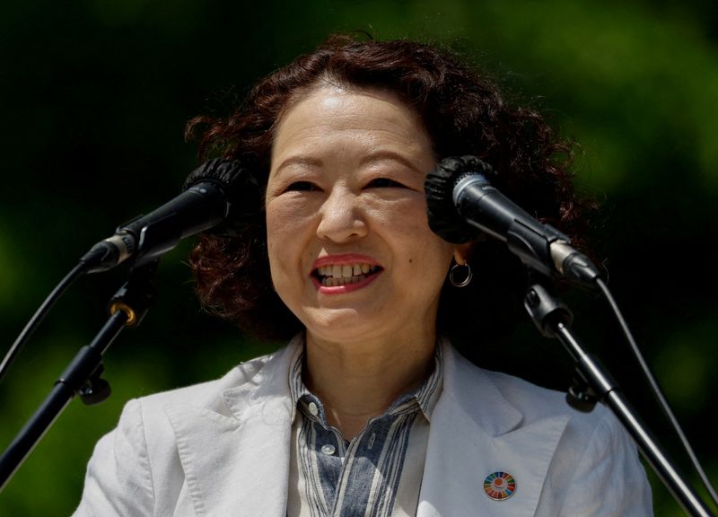 © Reuters. FILE PHOTO: Tomoko Yoshino, President of the Japanese Trade Union Confederation, commonly known as Rengo, delivers a speech during their annual May Day rally to demand higher pay and better working conditions, in Tokyo, Japan April 29, 2023. REUTERS/Issei Kato/File Photo