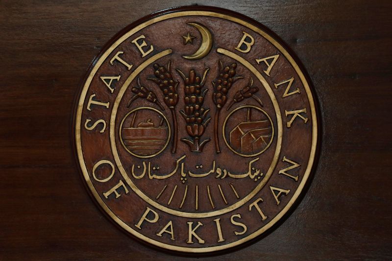  A logo of the State Bank of Pakistan (SBP) is pictured on a reception desk at the head office in Karachi, Pakistan July 16, 2019. REUTERS/Akhtar Soomro/File Photo