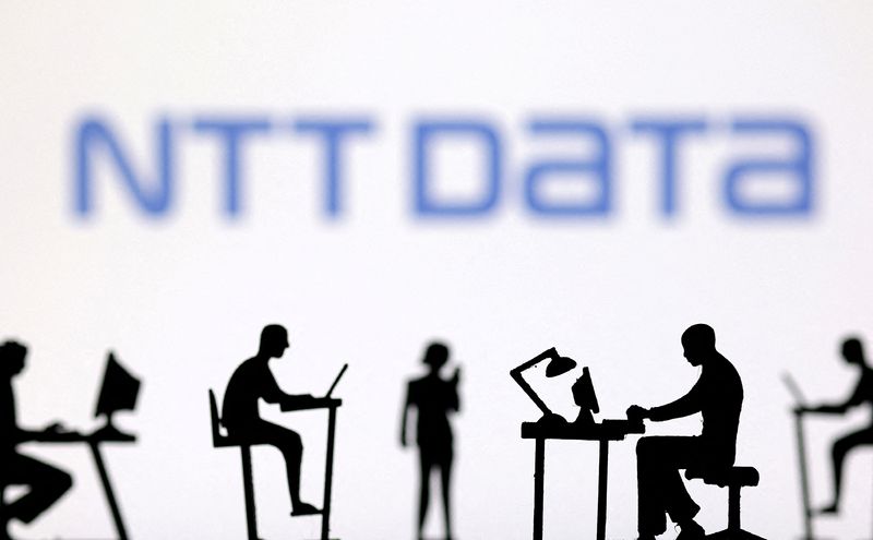  Figurines with computers and smartphones are seen in front of NTT DATA logo in this illustration taken, February 19, 2024. REUTERS/Dado Ruvic/Illustration/File Photo