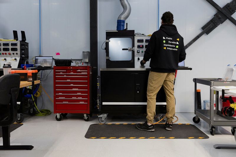 &copy; Reuters. FILE PHOTO: Mathieu Brillant, a fuel nozzle technician, operates a machine used to test a fuel injector used in helicopter engines, at commercial helicopter parts supplier, Optima Aero, in Beloeil, Quebec, Canada, January 17, 2025. REUTERS/Evan Buhler/Fil