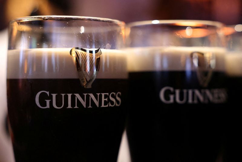 © Reuters. FILE PHOTO: Guinness beers sit on the bar at The Devonshire pub in Soho, London, Britain, October 10, 2024. REUTERS/Hollie Adams/File Photo