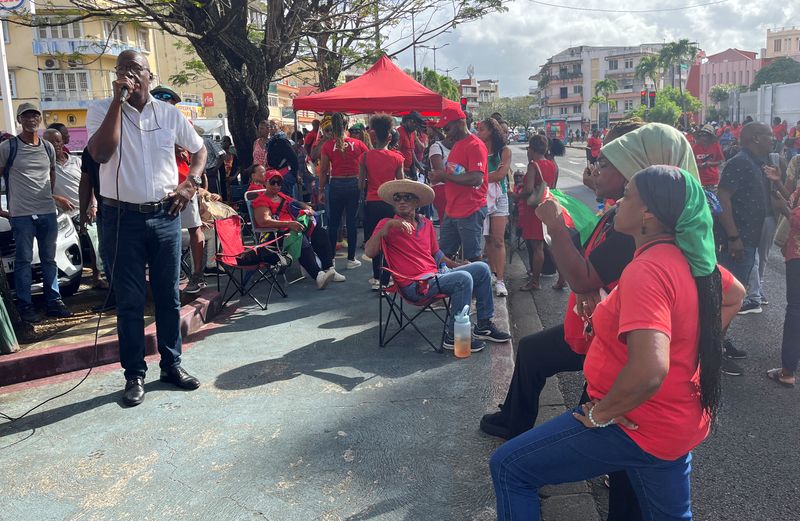  Protesters gather during the trial of activist Rodrigue Petitot who led the movement against high living costs on the French Caribbean island of Martinique, in front of the Judicial court in Fort-de-France, Martinique, January 21, 2025. REUTERS/Layli Foroudi/File Photo