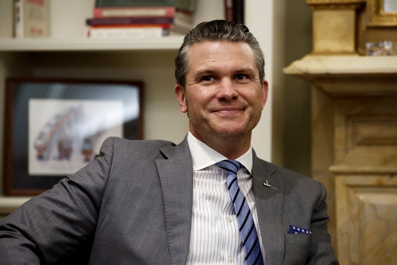 © Reuters. FILE PHOTO: President-elect Donald Trump's nominee to be Defense Secretary Pete Hegseth meets with U.S. Senators John Cornyn (R-TX) (not pictured), on Capitol Hill in Washington, U.S., December 10, 2024. REUTERS/Benoit Tessier/File Photo