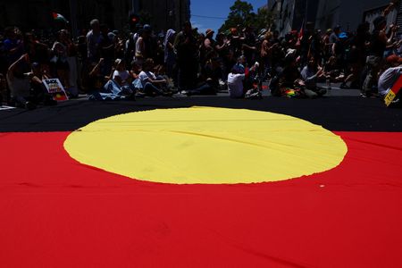 Monuments defaced as Australians protest, celebrate national day