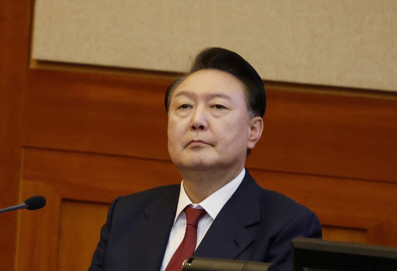 © Reuters. FILE PHOTO: South Korea’s impeached President Yoon Suk Yeol attends the fourth hearing of his impeachment trial over his short-lived imposition of martial law at the Constitutional Court in Seoul, South Korea, 23 January 2025. JEON HEON-KYUN/Pool via REUTERS/File Photo