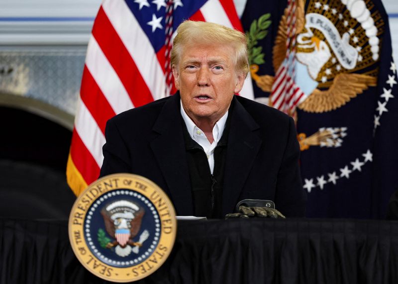 &copy; Reuters. U.S. President Donald Trump speaks during a disaster briefing at a hanger, as he visits to assess recovery efforts and tour areas devastated by Hurricane Helene, at Asheville Regional Airport in Asheville, North Carolina, U.S., January 24, 2025. REUTERS/L