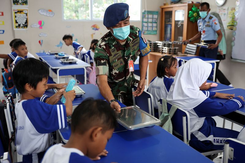Analysis-Indonesia's new leader expands military's role in test of fragile democracy