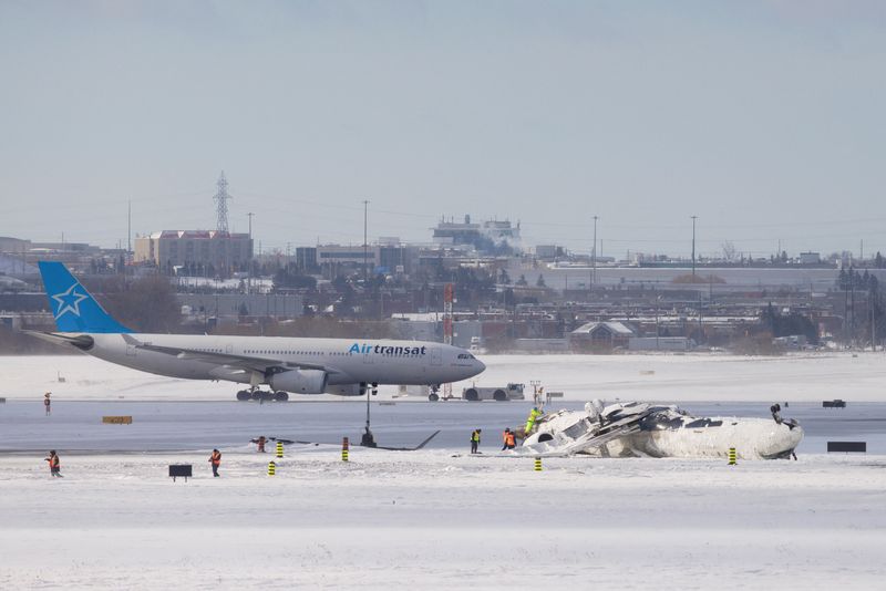 Explainer-How did a jet flip upside down on a Toronto runway and everyone survive?