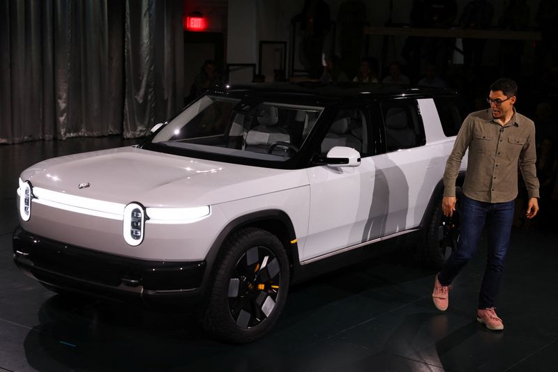 Rivian forecasts modest gross profit; shares rise