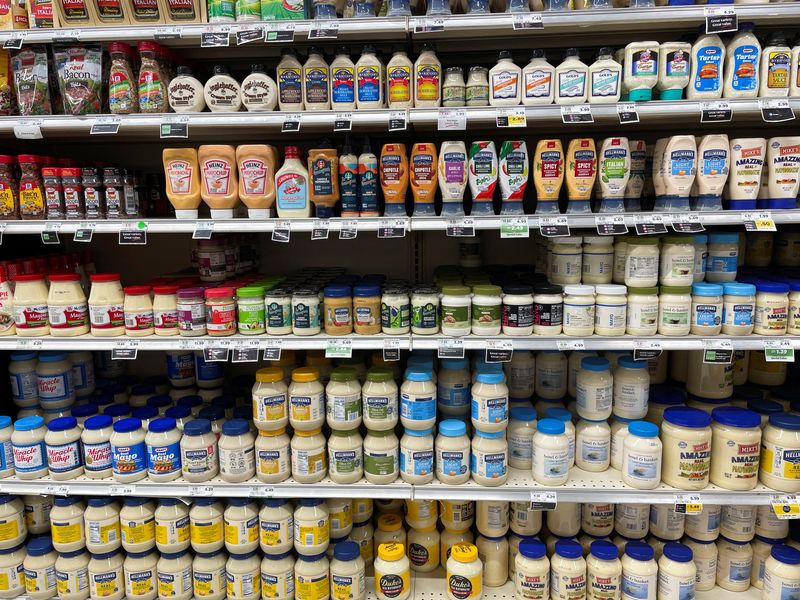 &copy; Reuters. Bottles of Hellmann's, Duke's and Mike's mayonnaise sit side by side on the lower shelf of a condiment aisle at a ShopRite store in Brooklyn, New York, U.S., February 26, 2025. REUTERS/Siddharth Cavale