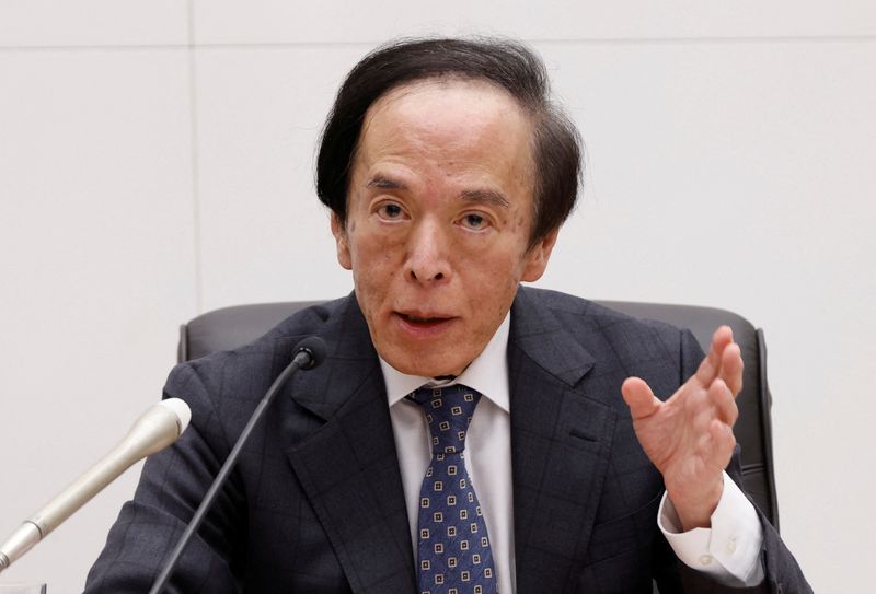 BOJ says to raise rates if price target to be achieved, despite losses on JGBs