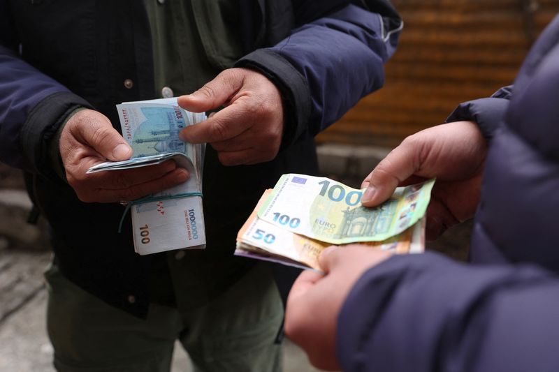 Iran's currency drops to a record low amid geopolitical uncertainty