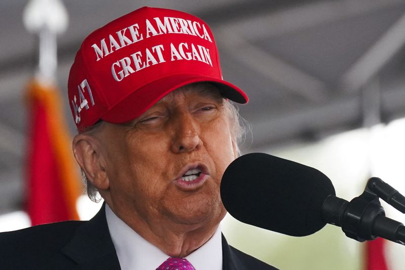 Trump says he is not happy with Putin for bombing Ukraine