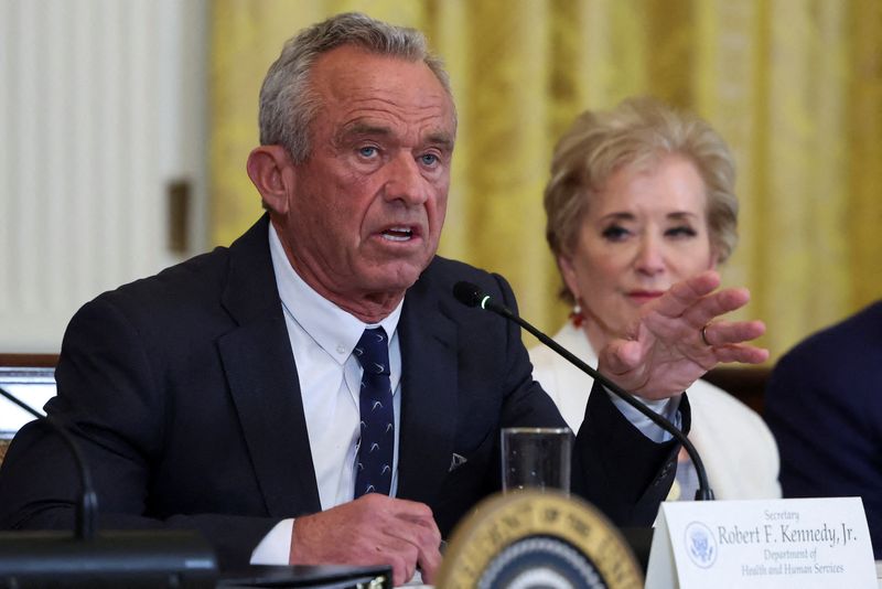 &copy; Reuters. FILE PHOTO: U.S. Health and Human Services (HHS) Secretary Robert F. Kennedy Jr. and Secretary of Education Linda McMahon attend a Make America Healthy Again (MAHA) Commission event, in the East Room of the White House in Washington, D.C., U.S., May 22, 2