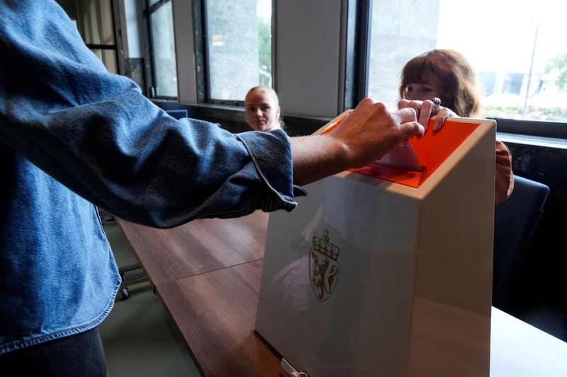 Norwegians vote as Labour Party narrowly favoured to win re-election