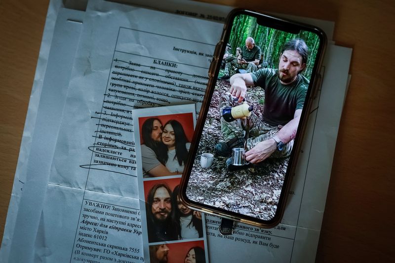 Ukraine struggles to identify thousands of soldiers' remains as relatives ache for news