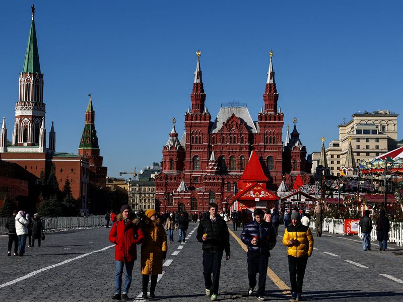 Putin signals tax hikes to close Russia’s budget gap