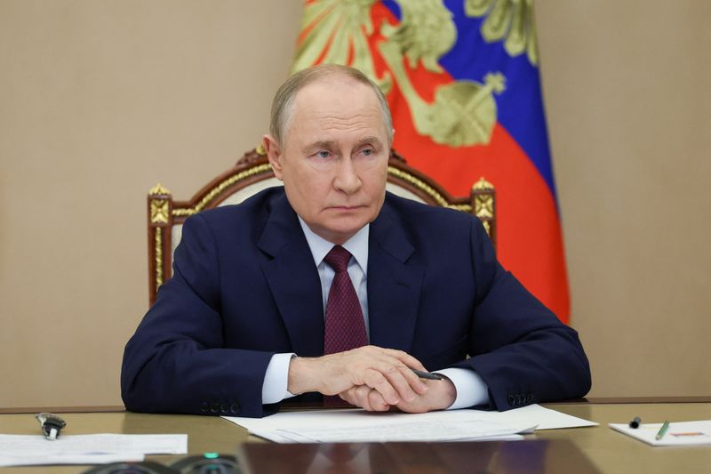 Putin says Russia is curbing economic growth to control inflation, recession ’far away’