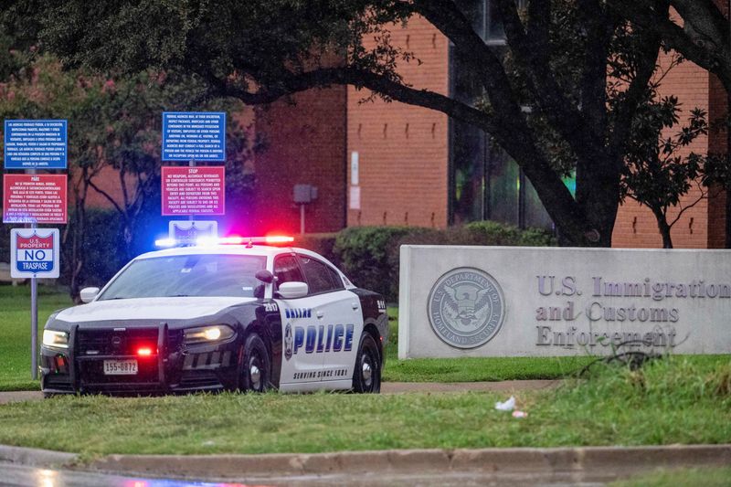 One killed in shooting at ICE office, suspect's rounds had anti-ICE messages, officials say