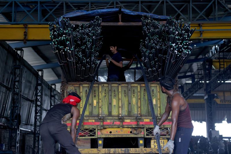 India’s September manufacturing growth cools as price rises soar to 12-year high, PMI shows