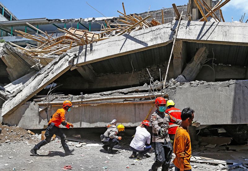 'Maybe there's hope': Indonesian rescuers race against time to save students trapped under rubble of collapsed school