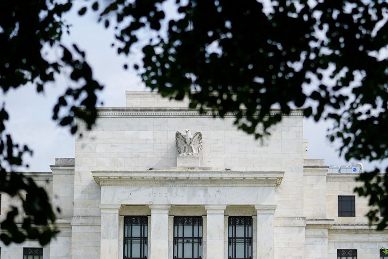 Analysis-Foreign investors can exploit cheaper dollar hedges as Fed easing resumes