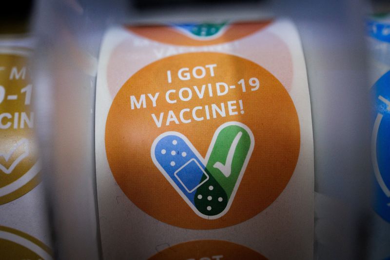 Factbox-Who can get a COVID booster in the US?