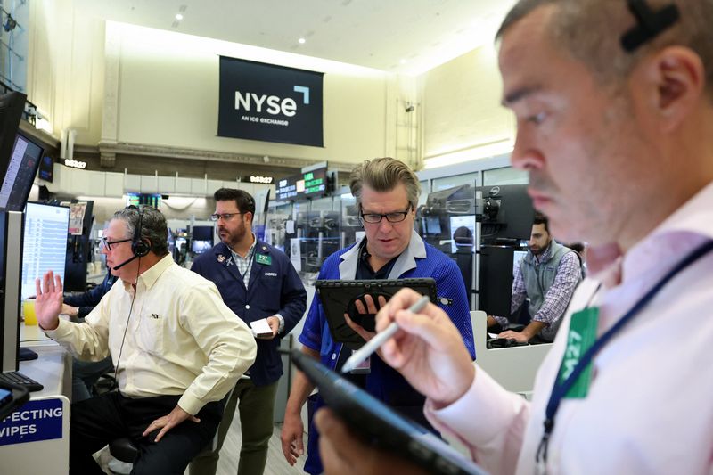 Wall St opens higher on positive bank results, chip stocks’ rally