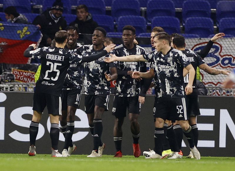 &copy; Reuters. Les Lyonnais n'ont pas gagné leur dernier match de groupe mais se qualifie en phase finale. /Photo prise le 9 décembre 2021/REUTERS/Christian Hartmann