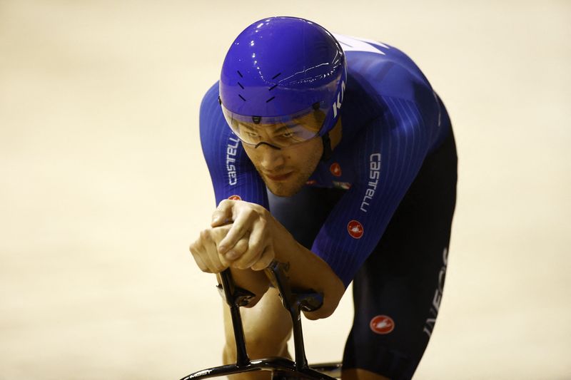 © Reuters. Le champion du monde de la discipline, Filippo Ganna, a remporté le contre-la-montre de Tirreno-Adriatico. /Photo prise le 22 octobre 2021/REUTERS/Christian Hartmann