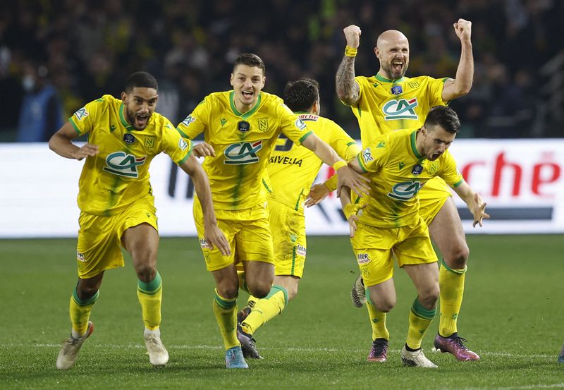 &copy; Reuters. La joie des joueurs nantais après leur victoire en Coupe de France. /Photo prise le 2 mars 2022/REUTERS/Stephane Mahe
