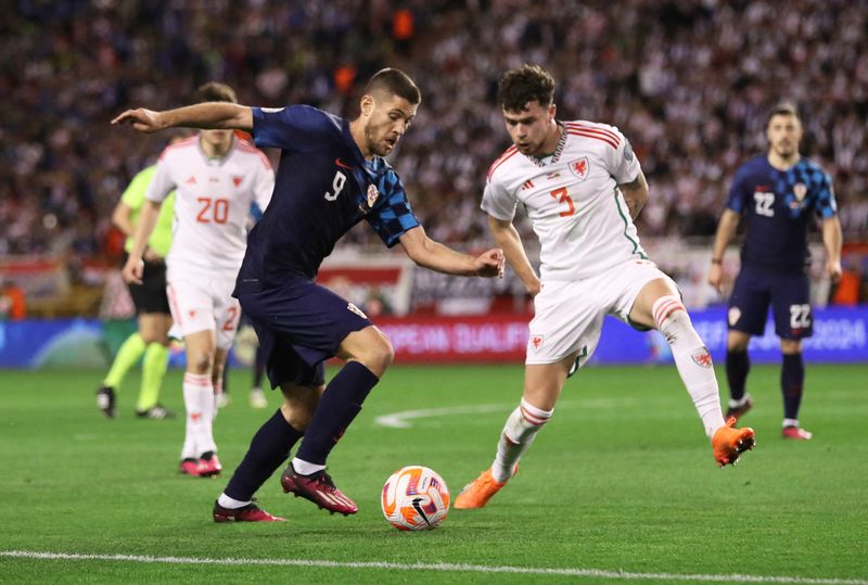 © Reuters. Andrej Kramaric avait ouvert le score dans cette rencontre mais la Croatie a concédé le match nul face aux Gallois. /Photo prise le 25 mars 2023/REUTERS/Antonio Bronic