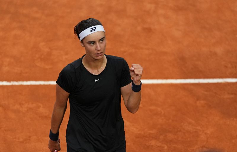 &copy; Reuters. Anhelina Kalinina célèbre sa qualification pour la finale du tournoi de Rome.  /Photo prise le 19 mai 2023/REUTERS/Aleksandra Szmigiel